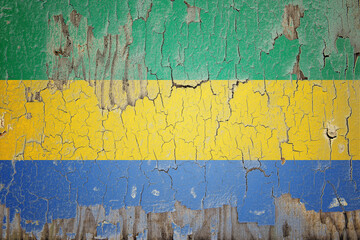 Gabon flag painted on the cracked wall