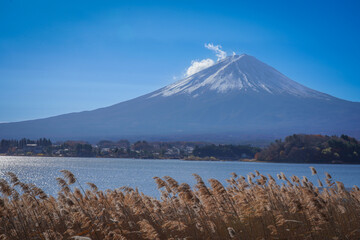 snow cap mountain fuji at kawaguchigo lake in early morning autumn season with couple honeymoon time good viewpoint