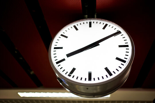 Clock telling time in the subway station
