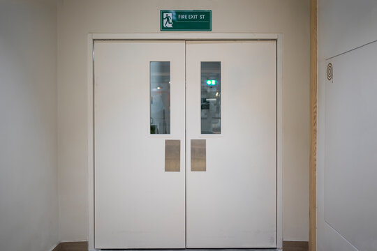 Emergency exit door. Fire exit door for emergency case with alarm for safety protection. Door, Fire Exit Sign, Lock, Emergency Sign, Push Button