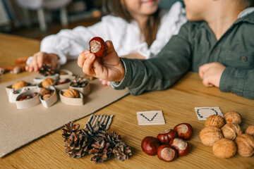 Montessori and Sensory Development, A child plays with natural materials