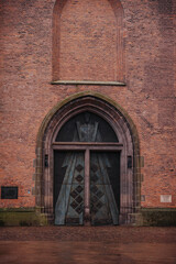 Medieval church tower Onze Lieve Vrouwetoren on a rainy day in Amersfoort, Netherlands. Gothic...