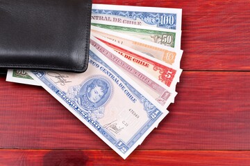 Old Chilean money in the black wallet