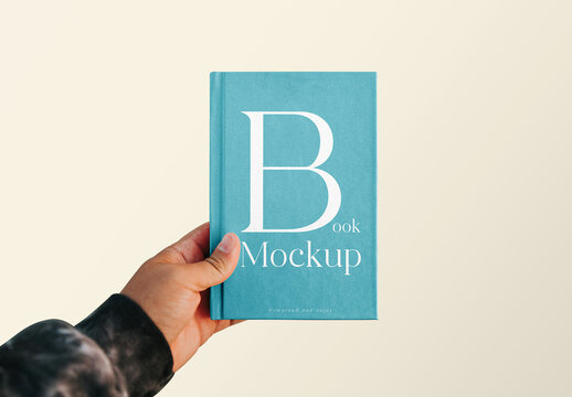 Book Cover with Hand Mockup