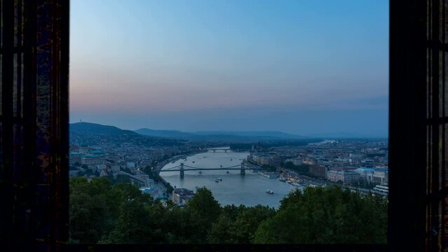 Buidapest city skyline aerial view time lapse from mday to night, budapest panorama at sunrise.