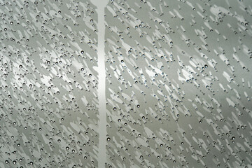 Close-up of glass wall of shower at apartment building with water drops and fogging at Swiss City of Zürich. Photo taken March 13th, 2024, Zurich, Switzerland.