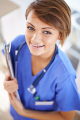 Woman, nurse and smile portrait with clipboard in medical office, nutritionist and stethoscope, professional nursing career. Results, healthcare and medic for wellness in uniform for surgery