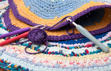 Colored rugs and crochet hooks