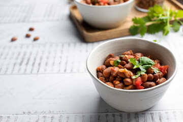  Vegetarian dish of stewed pink beans and tomatoes. A delicious bean dish served 