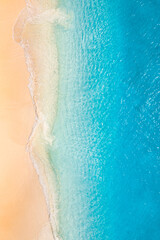 Summer seascape beautiful waves, blue sea water in sunny day. Top view from drone. Sea aerial view,...