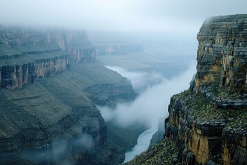 This photo captures a breathtaking view of a towering cliff offering an expansive vista of the...