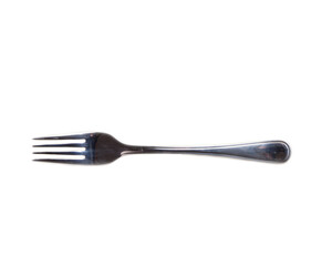 Stainless steel dinner fork on transparent background