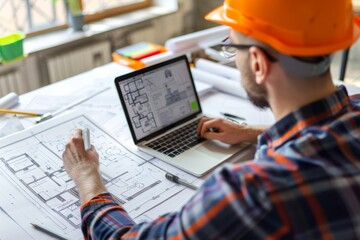 Architecture engineer working with blueprints and laptop in office. Inspection in workplace for architectural plan. Construction project. Adviser construction site engineer.