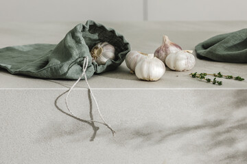 fresh herbs, organic garlic in linen bag. Kitchen aesthetic concept