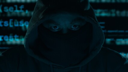 Hacker's Gaze Amidst Digital Chaos. Hooded figure with a masked face, program code in the...