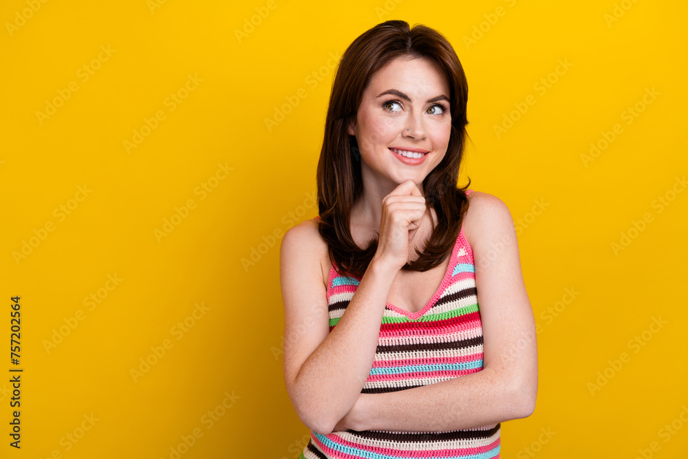 Sticker Portrait of adorable lovely woman with nose piercing dressed knitwear top look at promo empty space isolated on yellow color background