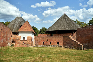 Fototapeta na wymiar courtyard and walls of a historic medieval castle in the city of Międzyrzecz
