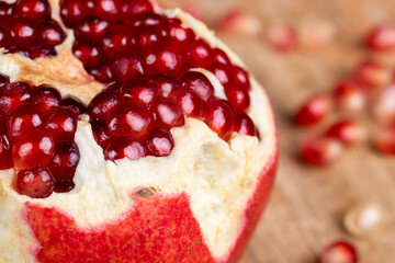 red ripe pomegranate with red grains