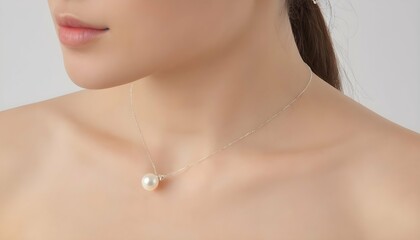 A Delicate Silver Necklace Adorned With A Single S