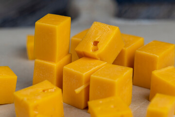 high-quality long-aged orange cheese made from milk