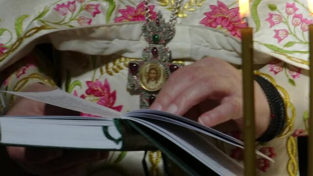 Candles, Bible, holy water in the Orthodox Church. Orthodox Church.