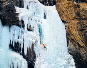 Ice climbing at frozen waterfall.