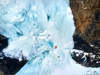 Ice climbing at frozen waterfall.