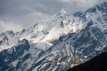 Fototapeta premium Majestic Snow-Covered Peaks Looming Over Langtang Valley, Nepal