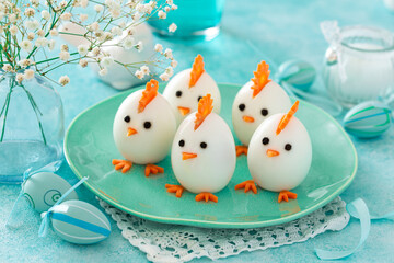 Funny eggs chicks. Easter idea for festive dinner - 757224188