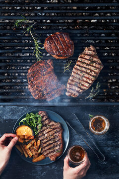 A sumptuous grill feast featuring a selection of meats, ready to satisfy any carnivore's appetite.
