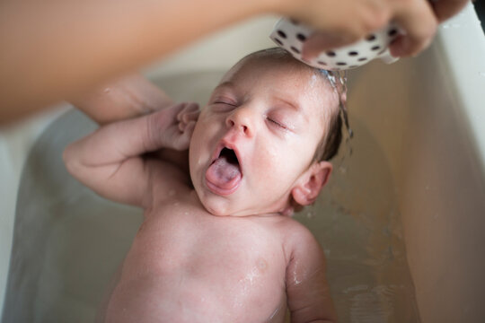 Baby's joyful bath time moment
