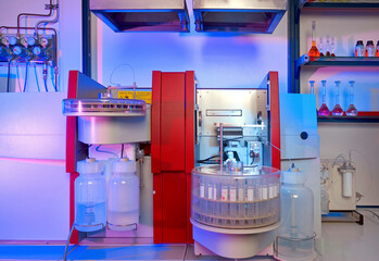 High-tech laboratory equipment illuminating the room with a blue glow