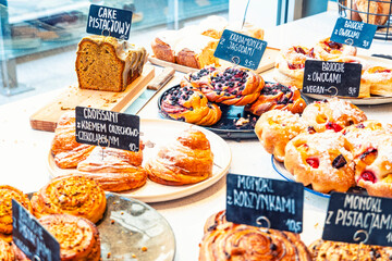 A tempting display of pastries in a bakery window