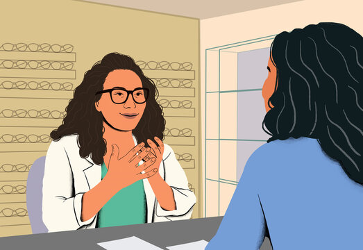 Optician consulting with a client in an eyewear store.