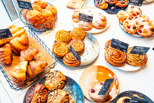 A tempting spread of freshly baked pastries on display at a cozy bakery.
