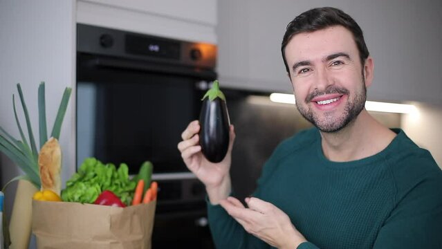 Man showing a nice eggplant  