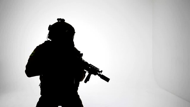 silhouette of soldier with modern rifle in white background, war and army concept