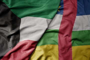 big waving national colorful flag of central african republic and national flag of kuwait.