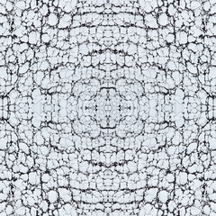 seamless repeatable background with white cracked and peeling silkscreen print on black material