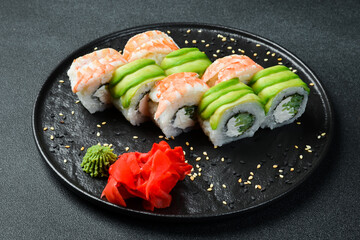 Sushi roll set with shrimp, avocado and cream cheese (Philadelphia). Asian cuisine. Top view. Free space for your text.