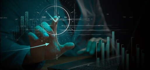 Cg tech collage. A businessman working on a laptop touches with his index finger a point on the...