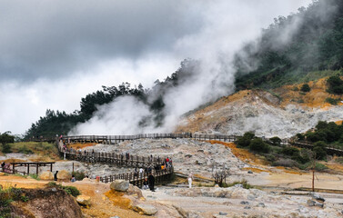 Thermal steam covering sulfuric active crater of Sikidang in Dieng Plateau, Wonosobo, 10 December 2023 © Simon