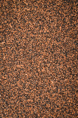 Brown sand background. Textured sand surface.