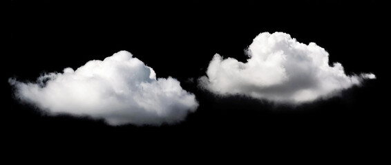 White cumulus clouds in front of a black background for multiply negatively. Cloudscape.