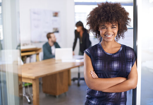 Smile, happy and portrait of woman in office, workspace and employee for creative career with staff or coworking. Female person, worker and intern for magazine, artistic job or newspaper company