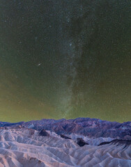 The milky way over a desert landscape in Death Valley