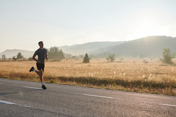 Determined Stride: Athletic Man Embarks on Marathon Preparation with Resolve.