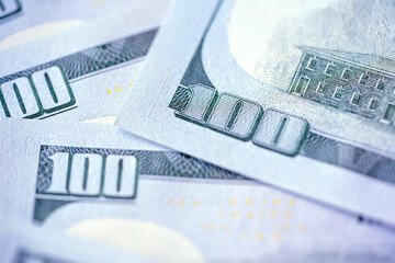 Close-up of a 100 dollar banknote. Dollars.Close-up view of stack of US dollars. Cash American Dollars