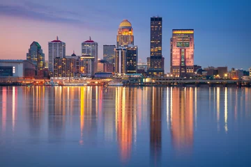 Fotobehang Louisville, Kentucky, USA. Cityscape image of Louisville, Kentucky, USA downtown skyline with reflection of the city the Ohio River at spring sunrise. © rudi1976