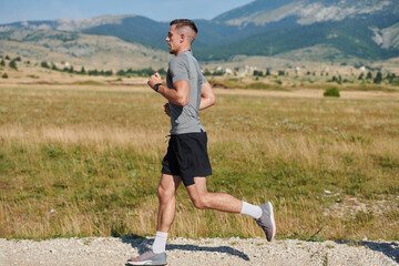 Determined Stride: Athletic Man Embarks on Marathon Preparation with Resolve.